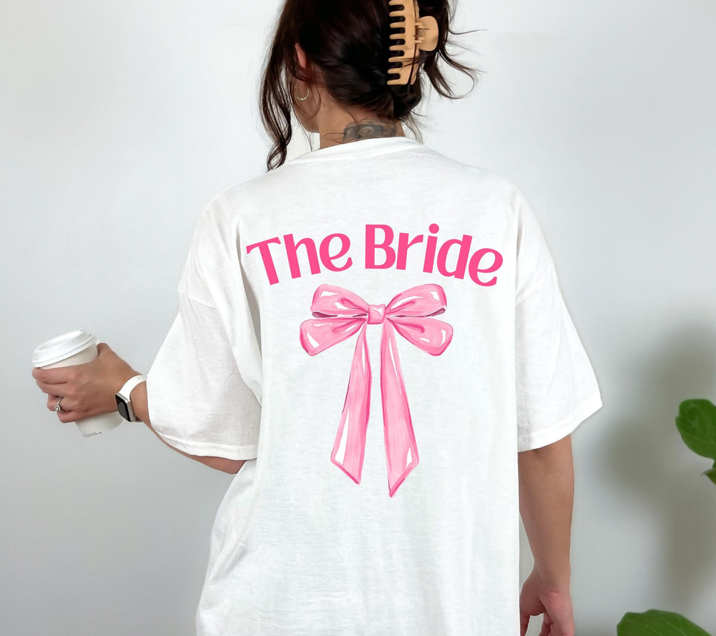 JGA Shirt rosa Schleife, Junggesellenabschied Frauen, Team Shirts, Braut Shirt süß, The Bride, JGA Frauen, Hochzeit, Cute T-Shirt Backprint